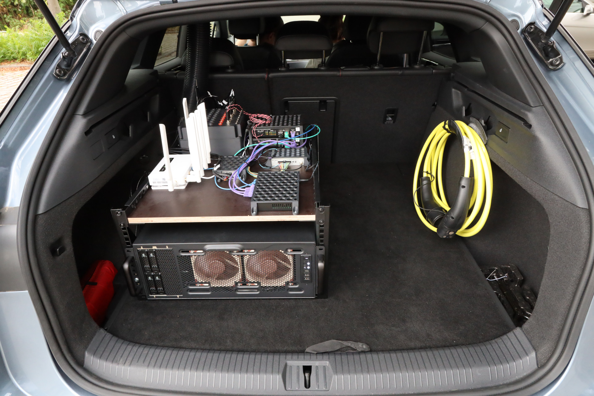 Onboard computer and networking equipment installed in the trunk.
